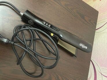 qarin ve bel piylerini eritmek: Braun saç ütüsü – geniş lövhəli, rəqəmsal göstəricili model — 1