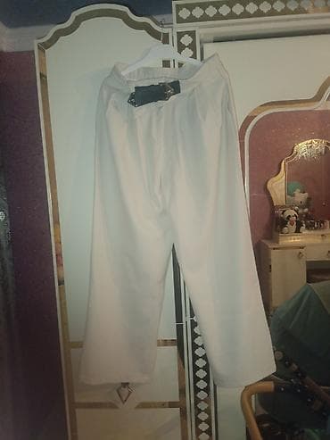 Ağ rəngli qadın şalvarı 40 Alinib 20 AZN satlr. - Model: yüksək