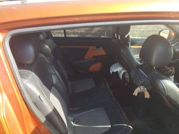 qadın üçün maşınlar: Kia Sportage: 2 l | 2011 il Ofrouder/SUV — 12