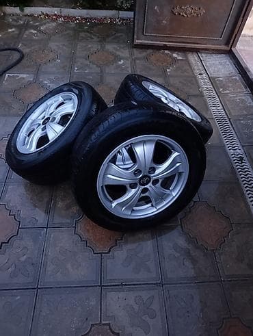 masin bezedilmesi: Disk təkər Toyota 215 / 60 / R 16, 5 Boltlu — 2
