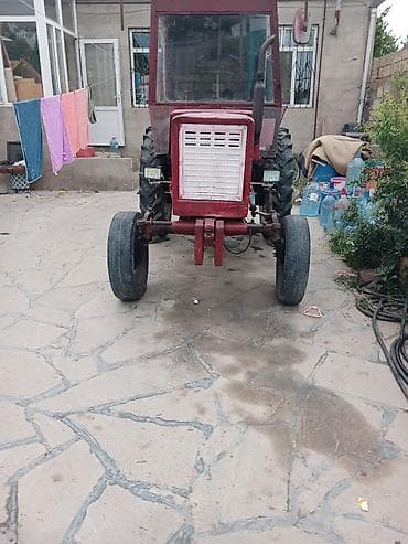 disk qabi: Qırmızı kabinəli traktor - Yanacaq: dizel - Çəki və güc sinfi: orta — 7