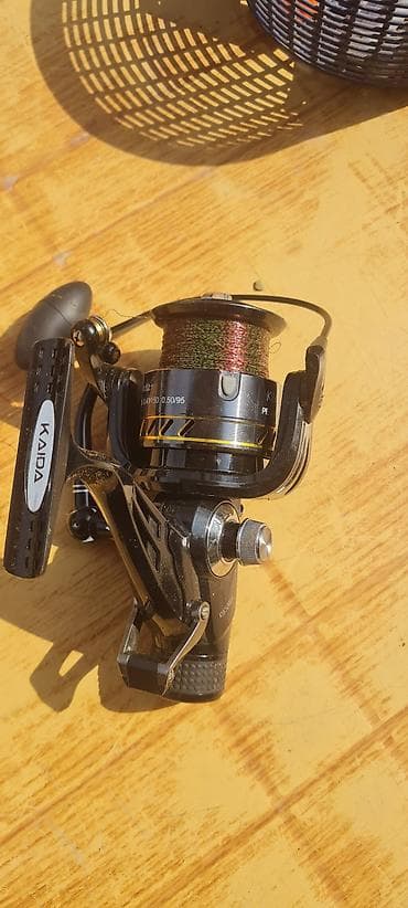 CD, DVD disklər və kassetlər: KAIDA fırlanan balıqçılıq makarası - Model: KAIDA (şəkildə “KW” — 1