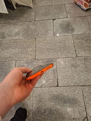 4g mifi modem bakcell: Redmi smartfon – narıncı rəngli korpus, arxa paneldə teksturalı səth — 5