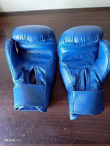Əlcəklər: Orijinal Adidas uşaq boks əlcəkləri satılır. Ölçüsü 4 oz (4-6 yaş — 3