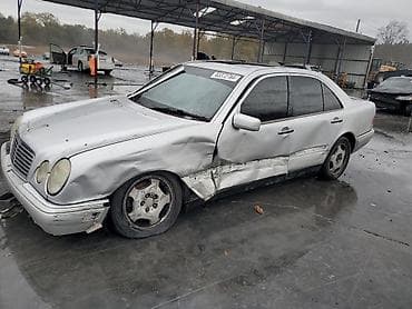 malibu arxa stop: Mercedes-Benz E-Class: 2 l | 1997 il Sedan — 1