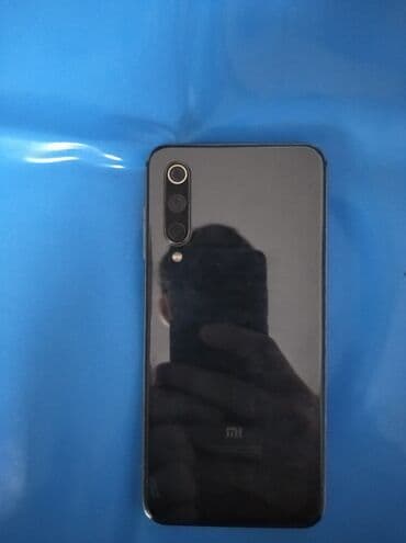 samsung galaxy alpha: Xiaomi Mi 9, 128 ГБ, цвет - Черный, 
 Отпечаток пальца — 2