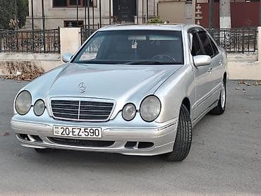 Mercedes-Benz E-Class (W210) sedan – gümüşü rəng. Əsas xüsusiyyətlər