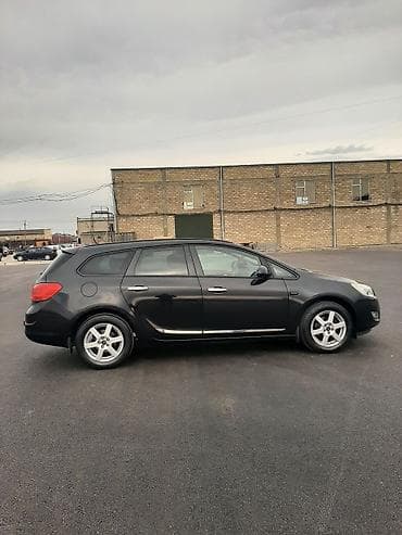 sükan lenti: Opel Astra: 1.4 l | 2011 il 188000 km Universal — 5