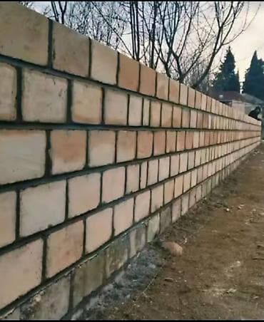 Kərpicdən hasar hörgüsü xidməti - Mülk ətrafının kərpiclə tam hörgüsü
