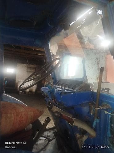 teker 18 type 1 per page 40: Mavi rəngli təkərli traktor - Kabinli, ikiqapılı konstruksiya - Dizel — 2