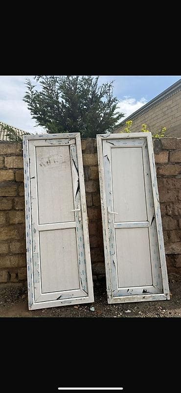 qarderob yuvası giriş zalı: Plastik qapi 2eded 220/80sm 60azn biri Sulutepe 5881 leli PVC qapı — 1