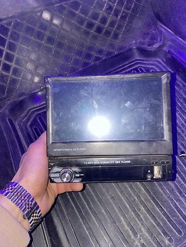 iphone 15 qiymet: Avtomobil üçün 1-DIN çıxan ekranlı multimedia maqnitola - 7.0 inch — 1