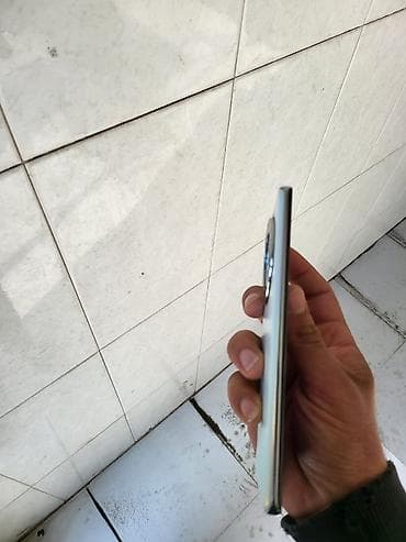 TV və video: Honor X9a, 128 GB, rəng - Göy, Barmaq izi — 4