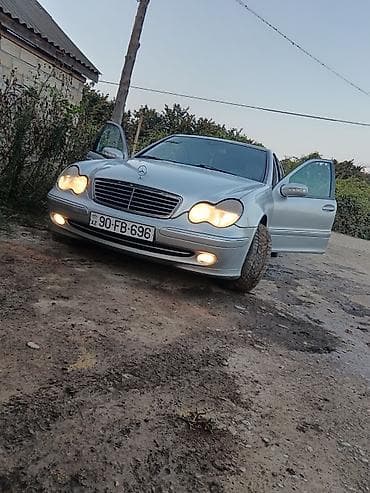 nomre altligi: Mercedes-Benz C‑Class (W203), gümüşü rəng. - Kuzov: sedan, klassik — 3