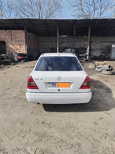 mercedes 190 1995: Mercedes-Benz C-Class: 2 l | 1995 il Sedan — 6