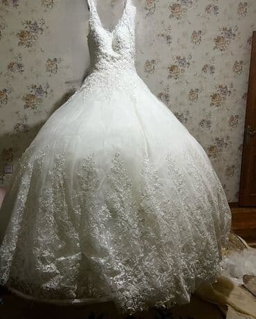 toy donları 2023: Zərif detallar ilə işlənmiş ağ gəlinlik 1 dəfə geyinilib Real — 1