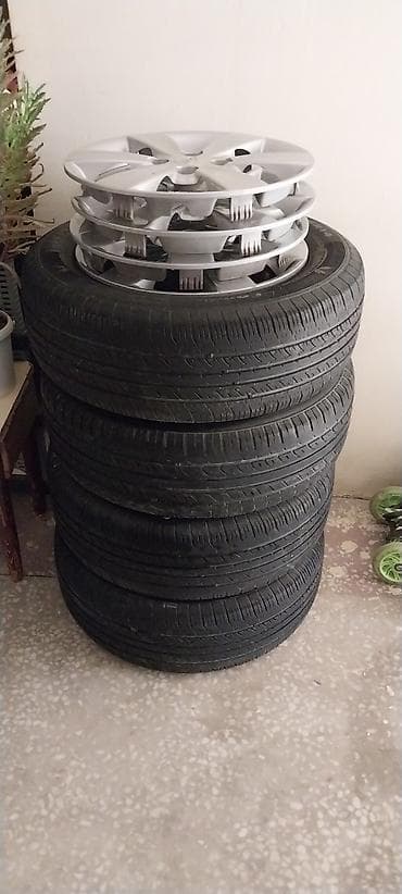 Б/у Колесо Kia 185 / 65 / R 14, 4 Болтов — 1