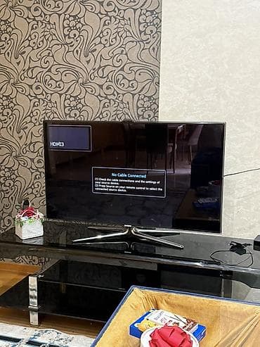 tv 107 ekran: Samsung LED televizor, diaqonal təxminən 46–50”. Qara, nazik çərçivəli — 1
