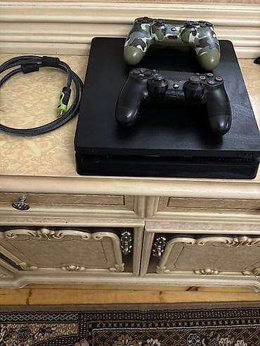 pleys: PlayStation 4 Slim oyun konsolu Xüsusiyyətlər: - Rəng: qara, yığcam — 6