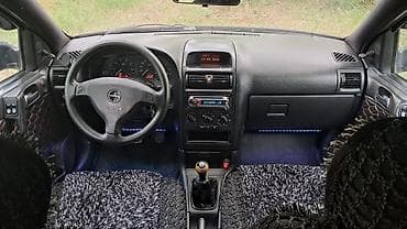 salon niva: Opel Astra: 1.6 л | 1999 г. 350000 км Хэтчбэк — 3