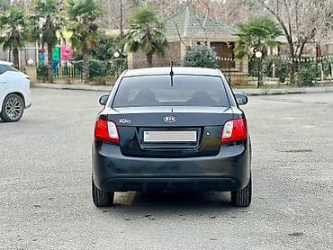 опель зафира а: Kia Rio: 1.4 л | 2011 г. Седан — 8