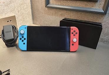 Elektronika: Nintendo Switch konsolu – neon mavi/qırmızı Joy‑Con nəzarətçiləri ilə — 8