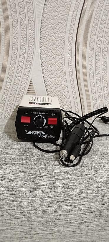 Dırnaq yonan aparat.1 il istifadə olunub.Səliqəlidir.Heç bir problemi