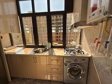 2 otaqlı evler: Yeni tikili binada zövqlü şəkildə təmir olunmuş, mebel və texnika ilə — 6