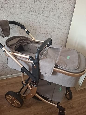 besik oyuncaq: Kidilo uşaq arabası platinium collection kofe renginde cox az istifade — 2