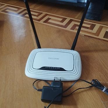 yeni modemler: TP-Link TL-WR841N 300Mbps Wireless N router. Iwlemiw - Model — 1