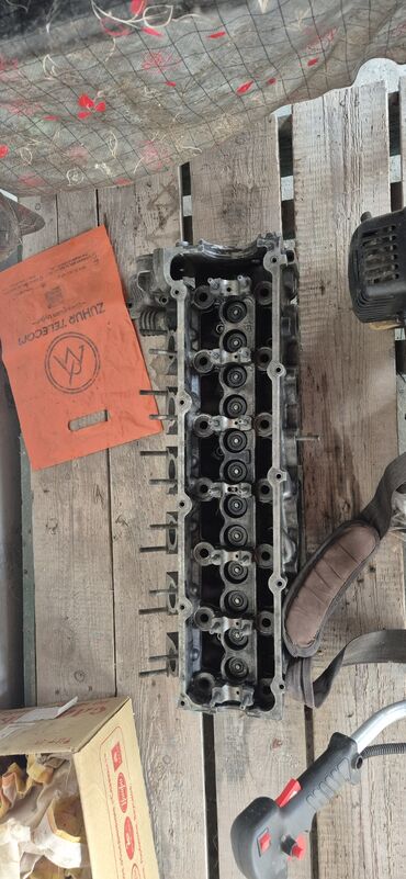 09 mator: Məhsul: Silindr başlığı (mühərrik üçün) Təsvir: - Uzun sırada 8 — 2