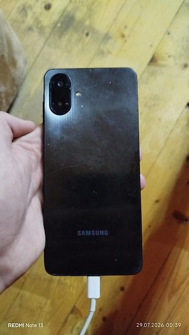 intel i5 notebook: Samsung Galaxy A07, 128 GB, rəng - Boz, Barmaq izi, Face ID — 2