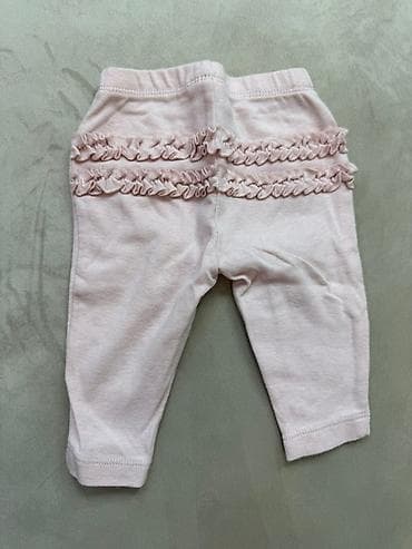 ag cins: Ağ rəngdə, elastik belə malik uşaq şalvarı. Diz nahiyələrində sevimli — 8
