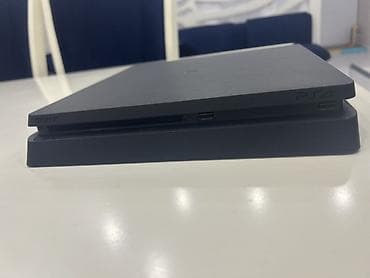Satılır Sony PlayStation 4 Slim 850 GB. Konsol tam işlək — 2