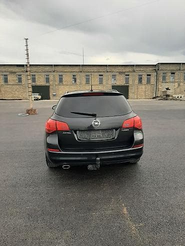 sükan lenti: Opel Astra: 1.4 l | 2011 il 188000 km Universal — 3