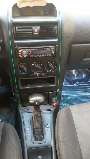 təkərlər r15: Opel Astra: 1.6 l | 1998 il Hetçbek — 1