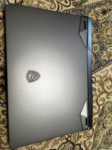 MSI oyun noutbuku Xüsusiyyətlər və dizayn: - Marka/model: MSI (oyun