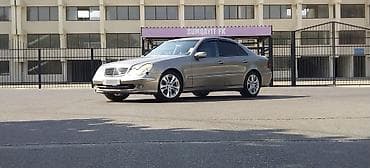 man tir: Mercedes-Benz E-Class: 2.7 l | 2003 il Sedan — 1
