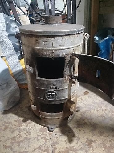 dəmir sac: Çuqun odun/kömür sobası – silindrik korpuslu, üstü qapaqlı və baca — 2