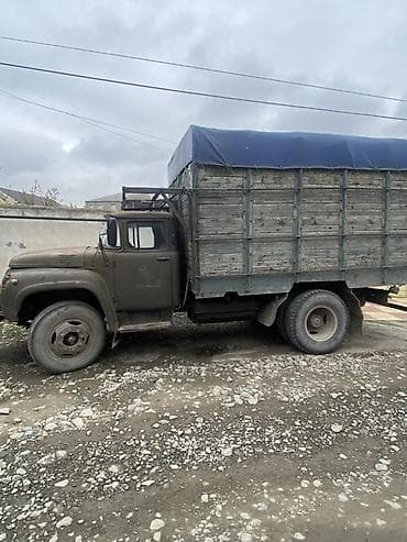 014 maşın: Yük maşını – taxta bortlu, tentli üst örtük Hazir magar ve masini ile — 2