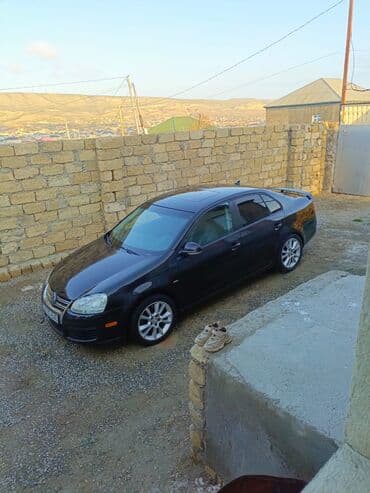 oturucu: Volkswagen Jetta: 2 l | 2009 il Sedan — 9