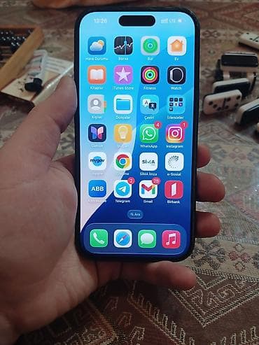 muzukalni centir: IPhone 15, Qara, Face ID — 7