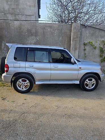 niva satisi: Mitsubishi Pajero iO – 4WD, avtomat - Ban növü: kompakt SUV (Pajero — 7