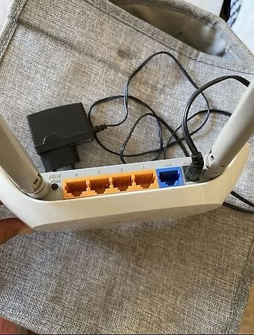 printer lazer: TP-Link Wi‑Fi router - Model: TP-Link TL-WR841N (etiketdə göstərilib) — 4