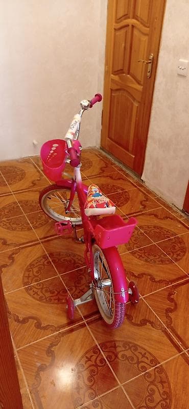 velosiped usaq: Uşaq velosipedi – qızlar üçün, çəhrayı rəng. Xüsusiyyətlər: - Təxmini — 4