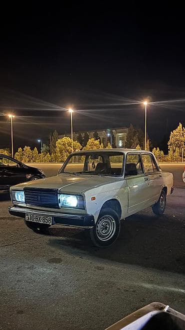 qazel kuza: Avtomobil: Lada 2107 (sedan) Rəng: Açıq bej/ivory Dövlət nömrə nişanı — 7