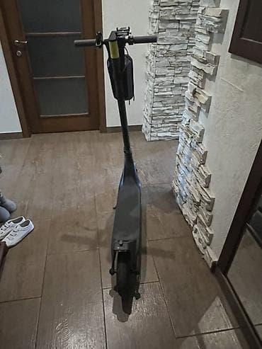 electro gitara: Xiaomi elektrik skuter. Şəkillərdə qara rəngli, minimalist dizayna — 8