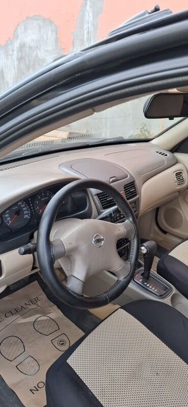 osram lampaları: Nissan Sunny sedan – geniş salonlu, komfortlu şəhər və uzun yol — 2