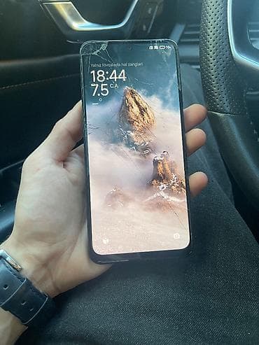 Xiaomi 12, 128 GB, 
 Düyməli, Barmaq izi, İki sim kartlı — 1