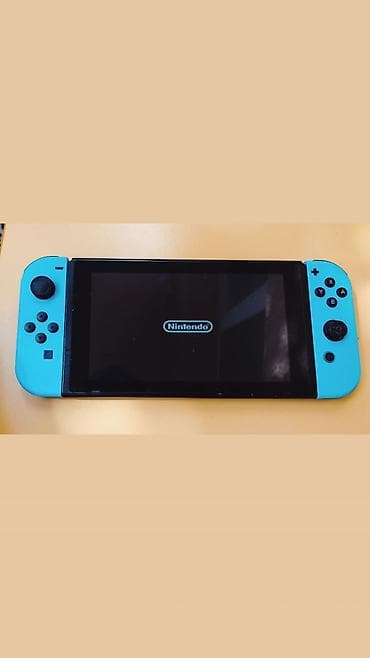 Nintendo Switch oyun konsolu - Model: Nintendo Switch (daşına bilən